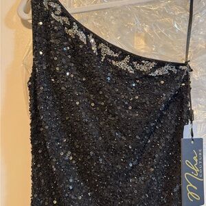Black and silver high side slit beaded and sequin gown . size us 4 brand new .